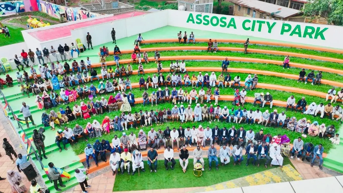 Crowd seated on the terraces of the Assosa City Park amphitheatre
